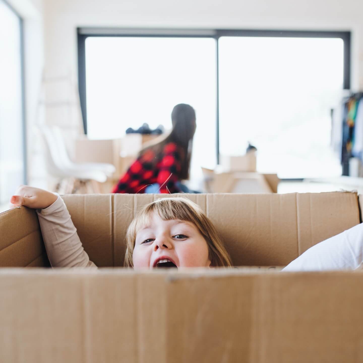 smiling boy in box